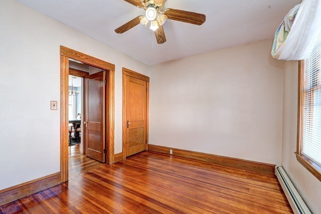 89-91 Larchwood Road Methuen, MA 01844 - Photo 26 of 39 wooden floor in an empty room with a window