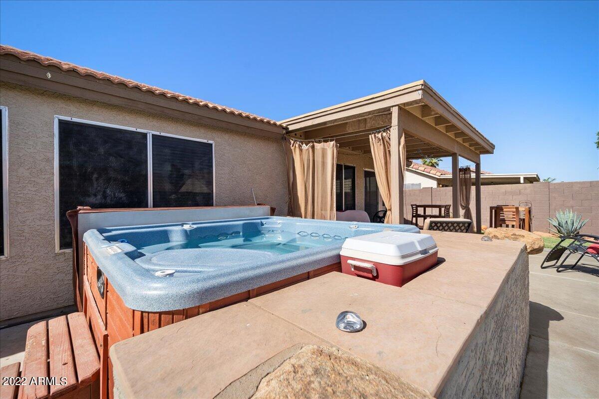 1836 East Darrel Road Phoenix, AZ 85042 - Photo 25 of 28 a backyard of a house with table and chairs