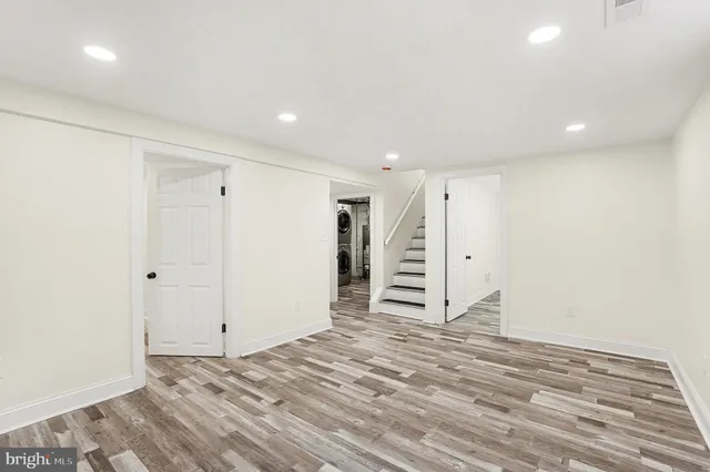 a view of a livingroom with wooden floor