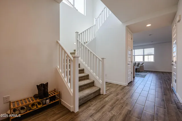 a view of entryway with wooden floor