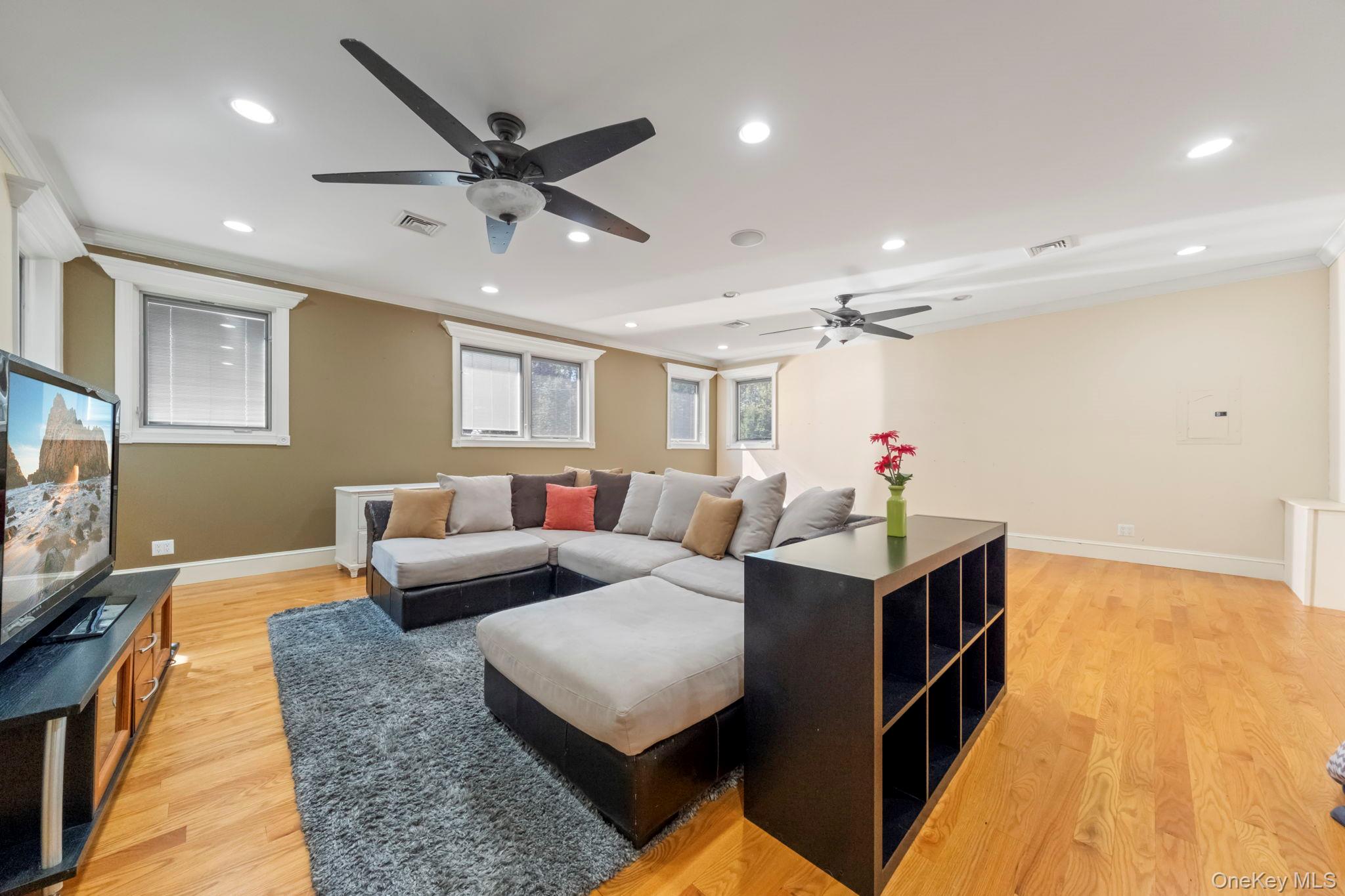62 Middletown Point Road Rock Hill, NY 12775 - Photo 22 of 42 a living room with furniture and a chandelier