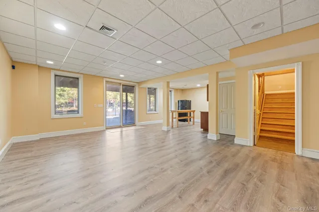 a view of a livingroom with wooden floor