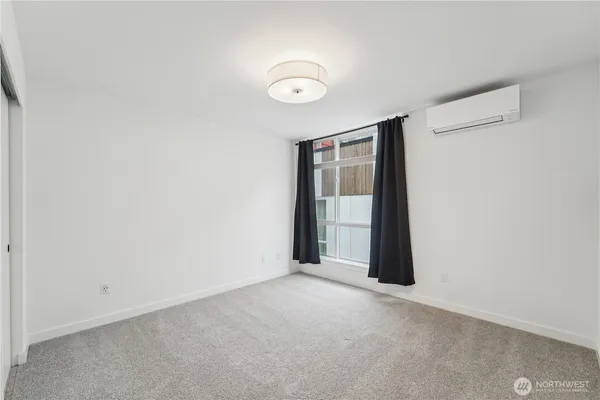 a view of an empty room and window