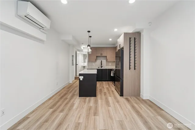 a view of kitchen with wooden floor