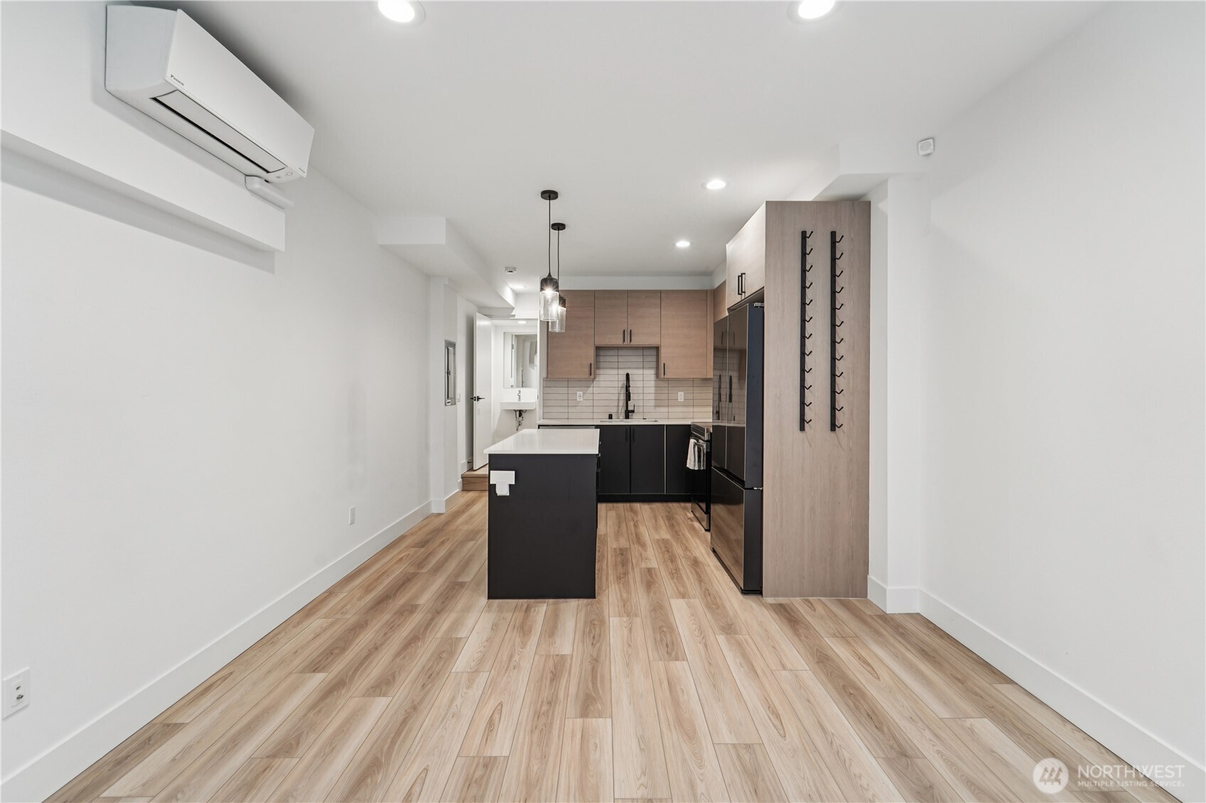 909 Hiawatha Place South, Unit B Seattle, WA 98144 - Photo 6 of 22 a view of kitchen with wooden floor