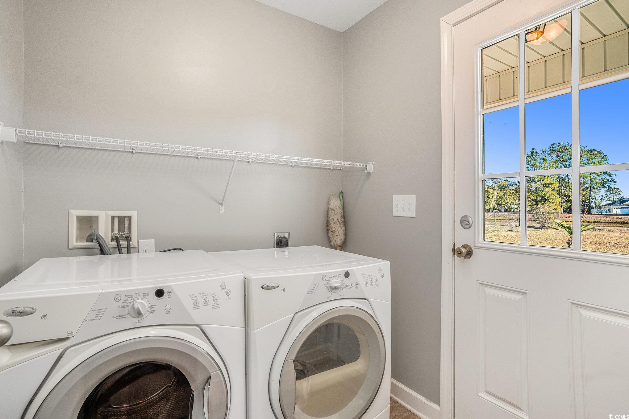 265 Georgia Mae Loop Conway, SC 29527 - Photo 12 of 28 Laundry room featuring washer and clothes dryer and baseboards