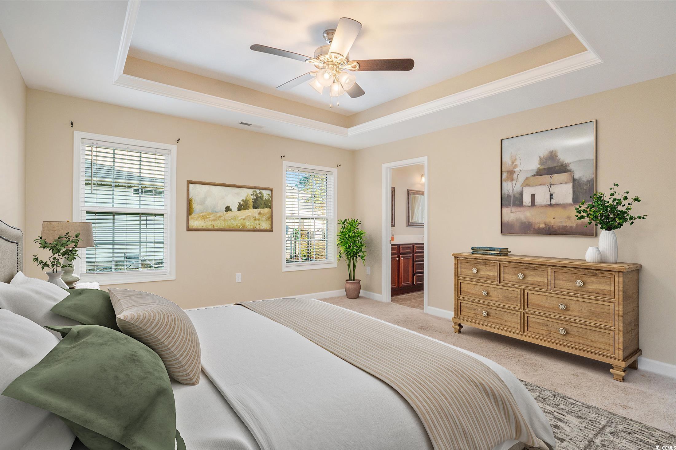 265 Georgia Mae Loop Conway, SC 29527 - Photo 6 of 28 Carpeted bedroom with a raised ceiling, multiple windows, ceiling fan, and ensuite bath
