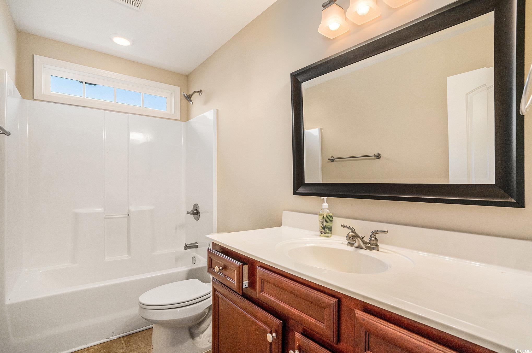 265 Georgia Mae Loop Conway, SC 29527 - Photo 10 of 28 Full bath featuring shower / washtub combination, vanity, and light tile patterned floors