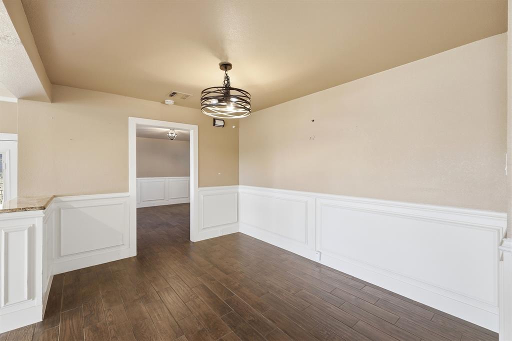 809 Cardinal Circle Bedford, TX 76022 - Photo 17 of 40 Dining area is open to kitchen and living room.