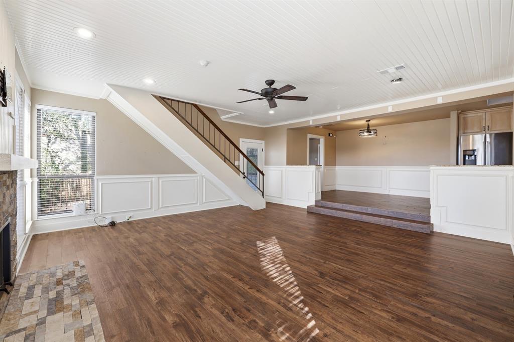 809 Cardinal Circle Bedford, TX 76022 - Photo 19 of 40 Living room with new laminate flooring.