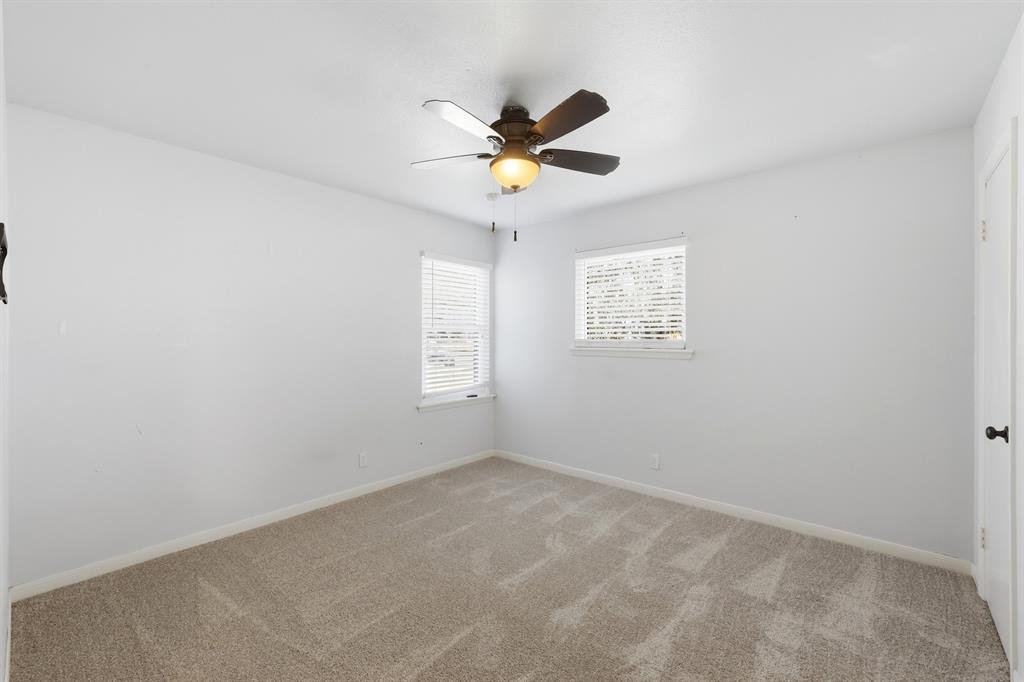 809 Cardinal Circle Bedford, TX 76022 - Photo 23 of 40 Bedroom #3 on 1st floor with new carpet.