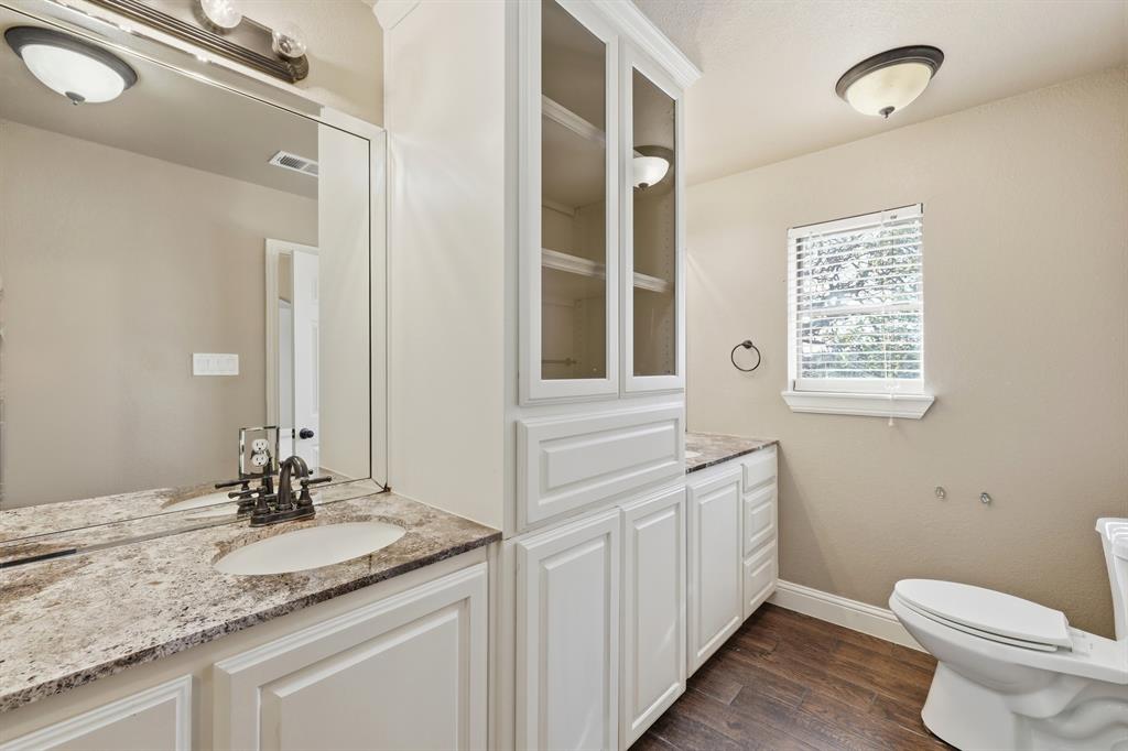 809 Cardinal Circle Bedford, TX 76022 - Photo 30 of 40 Updated primary bathroom.