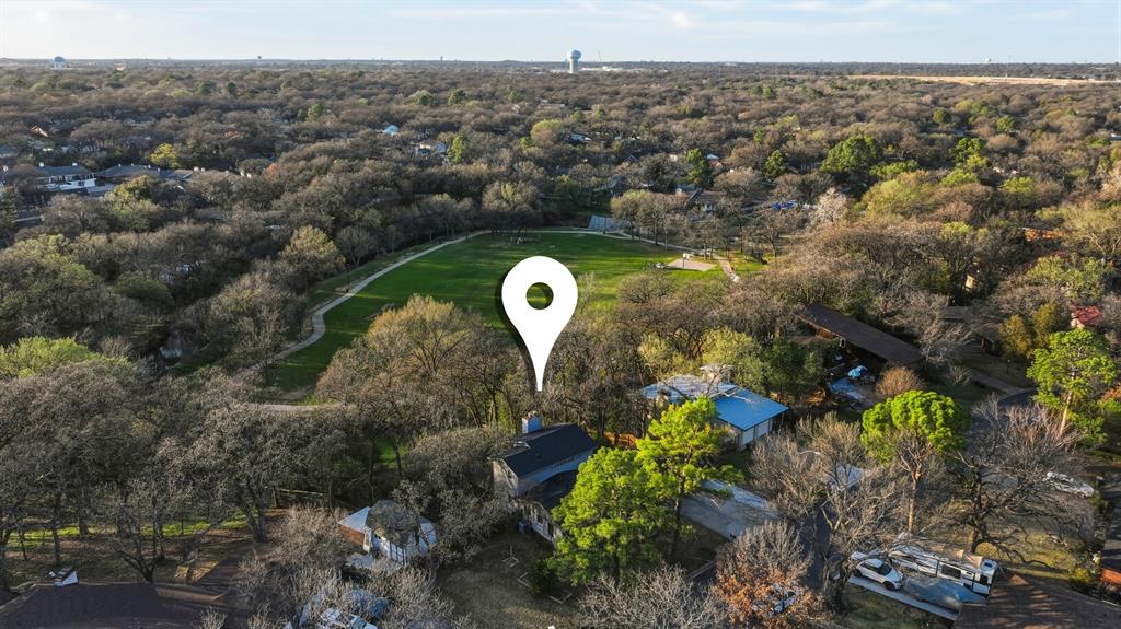 809 Cardinal Circle Bedford, TX 76022 - Photo 3 of 40 0.59 acre lot overlooking Brook Hollow Park and trails with gate access to the trails.