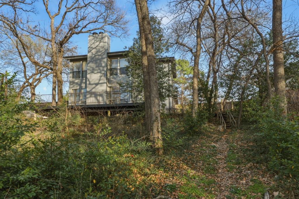 809 Cardinal Circle Bedford, TX 76022 - Photo 36 of 40 Cantilevered deck with tons of trees!