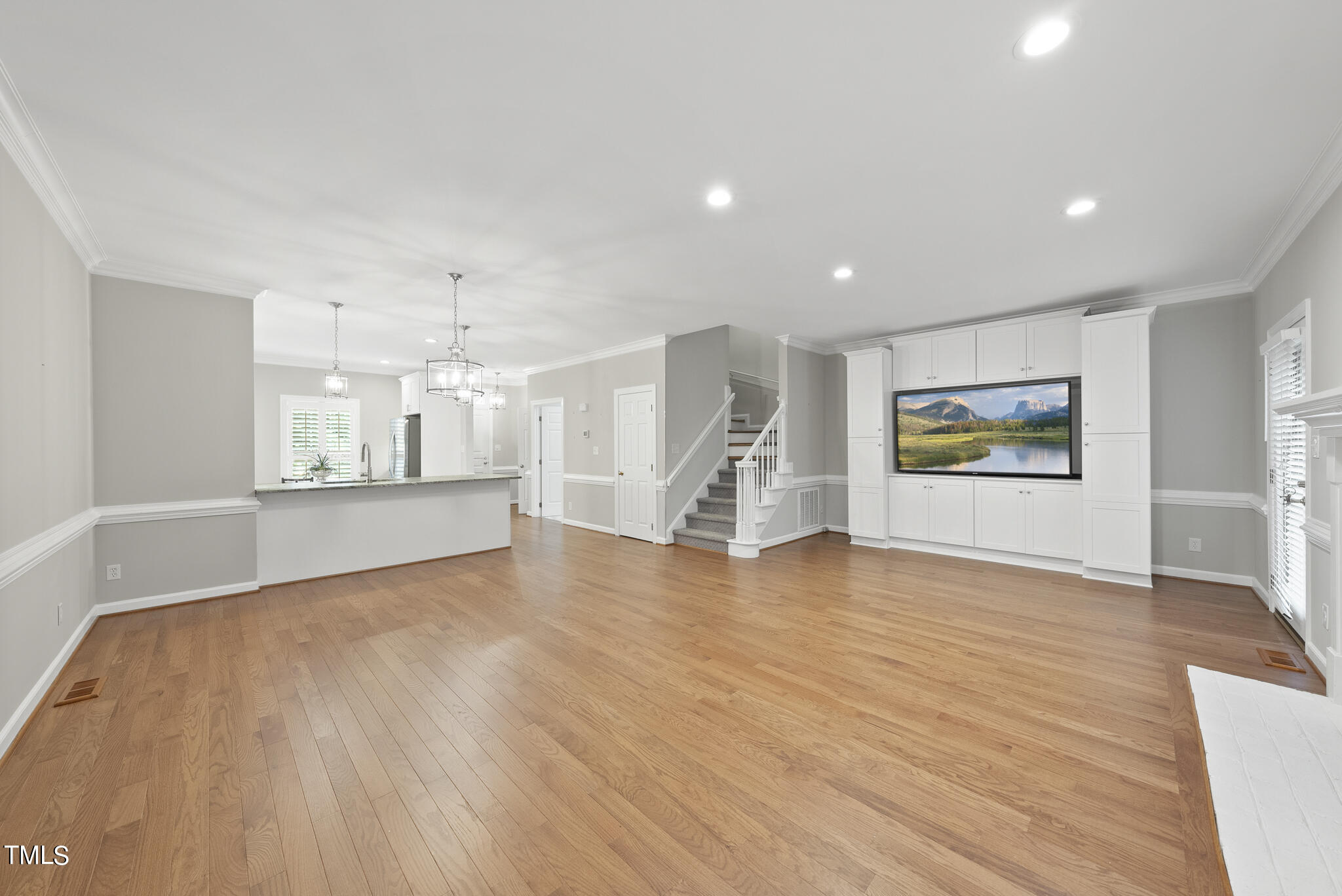 628 Weathergreen Drive Raleigh, NC 27615 - Photo 7 of 30 Custom built-in entertainment center and the 85" TV is yours!