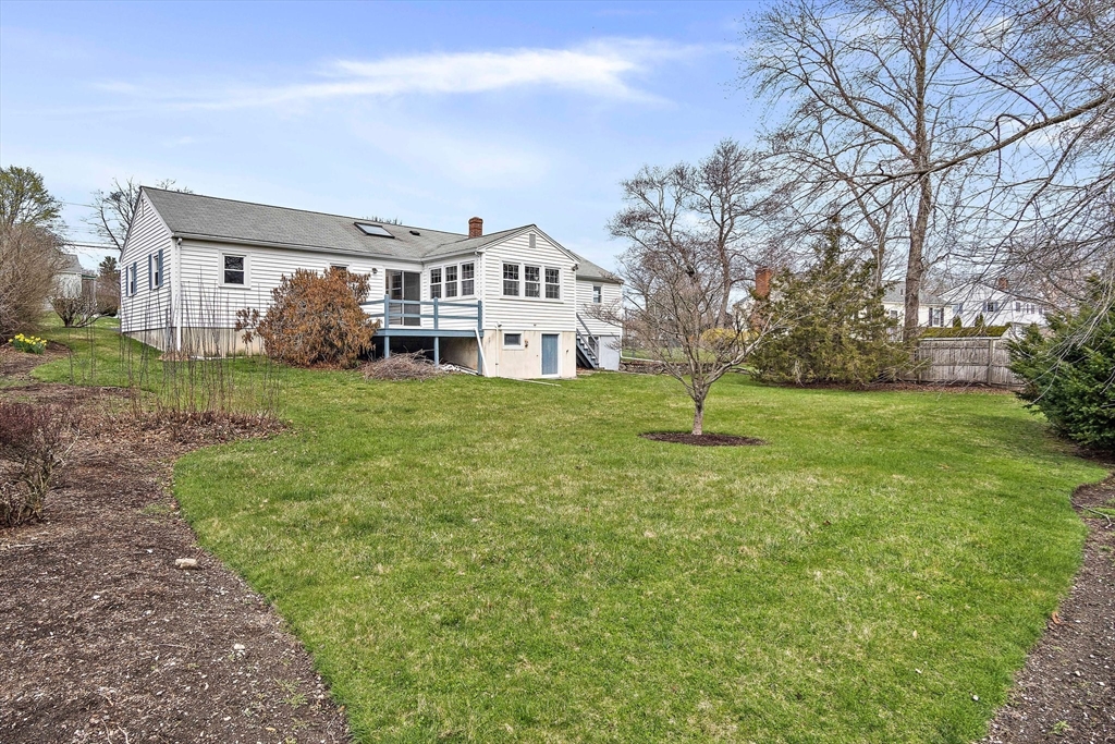 22 Anna Road Woburn, MA 01801 - Photo 29 of 37 a front view of a house with a yard