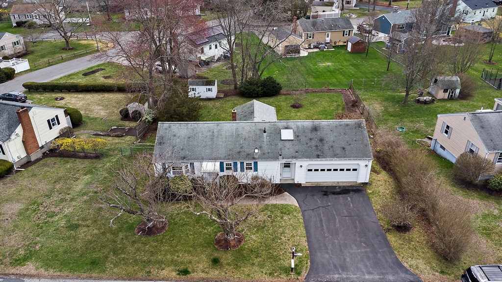 22 Anna Road Woburn, MA 01801 - Photo 34 of 37 an aerial view of a house with a garden