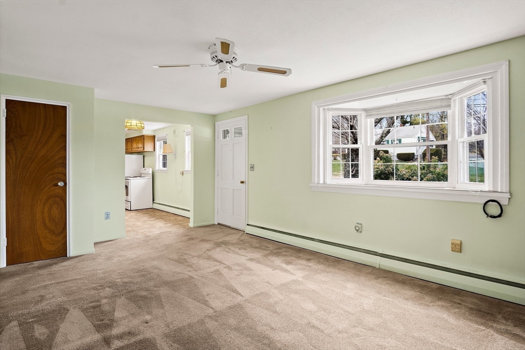 22 Anna Road Woburn, MA 01801 - Photo 4 of 37 a view of an empty room with a window