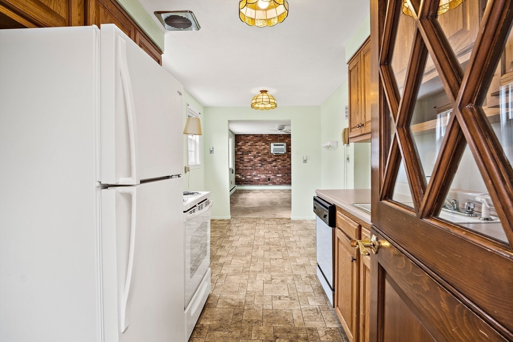 22 Anna Road Woburn, MA 01801 - Photo 10 of 37 a view of hallway with furniture and a window