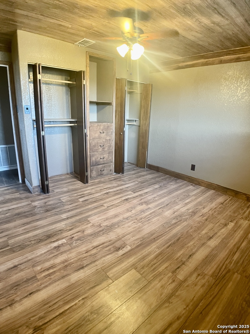 3010 Triple Tree Drive China Grove, TX 78263 - Photo 12 of 18 a view of empty room with wooden floor