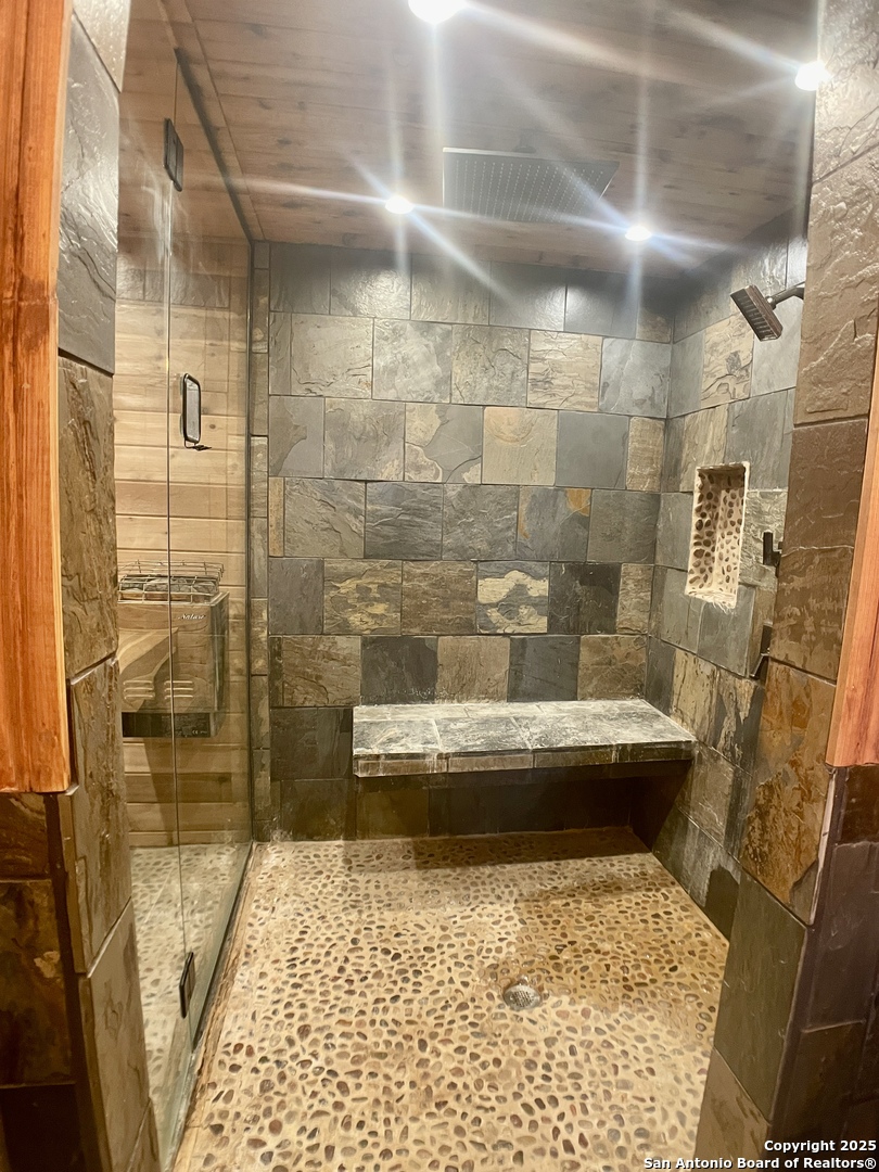 3010 Triple Tree Drive China Grove, TX 78263 - Photo 15 of 18 a bathroom with a glass door shower