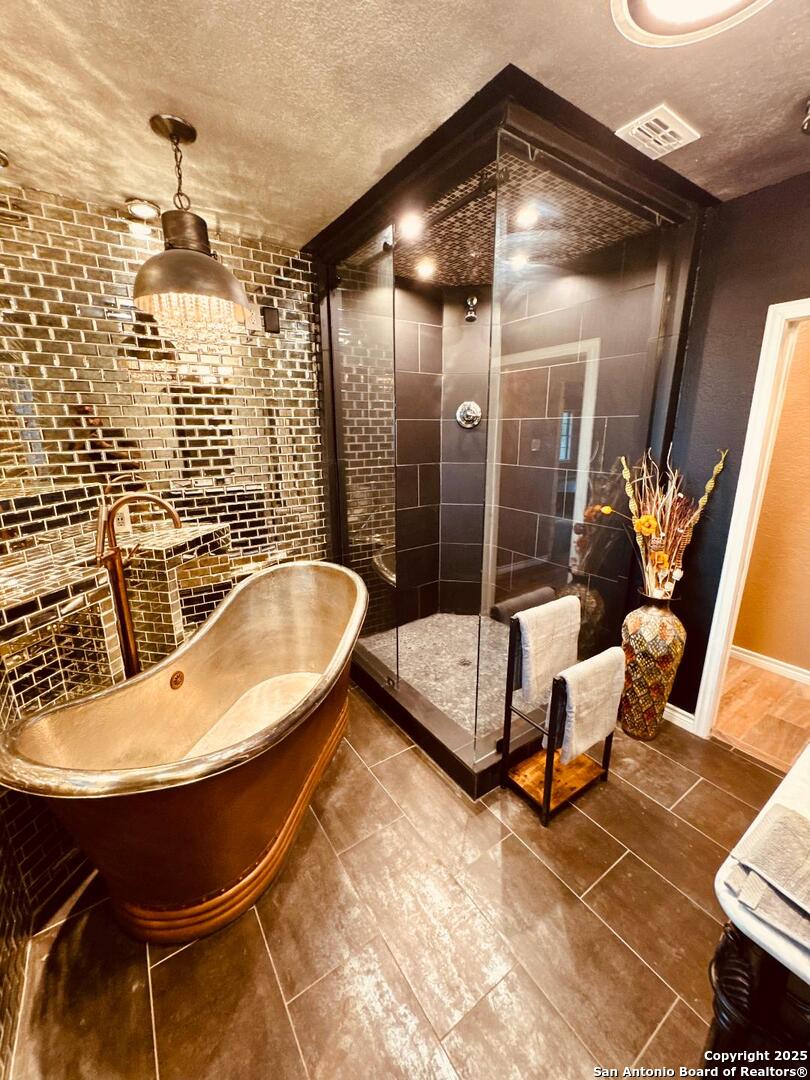 3010 Triple Tree Drive China Grove, TX 78263 - Photo 10 of 18 a bathroom with a sink and mirror