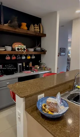 a room with lots of different colored cloths