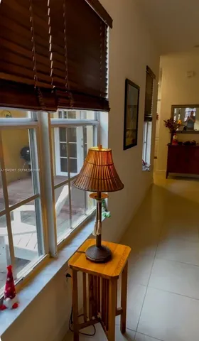 a front view of a house with chairs