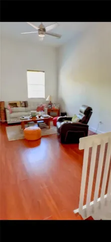 a view of a swimming pool and lounge chair