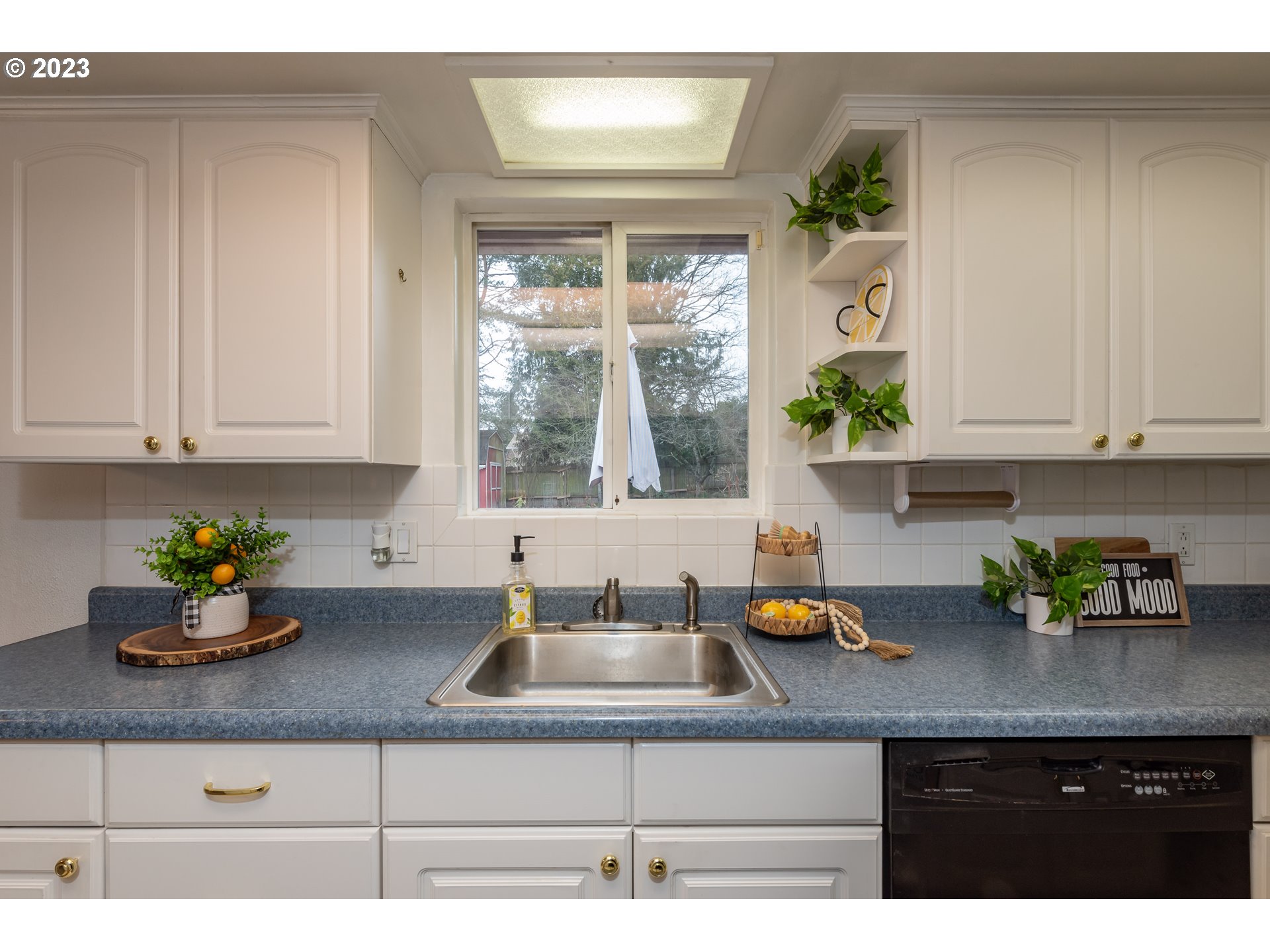 2434 Southwest 328th Street Federal Way, WA 98023 - Photo 12 of 31 a kitchen with a sink and window