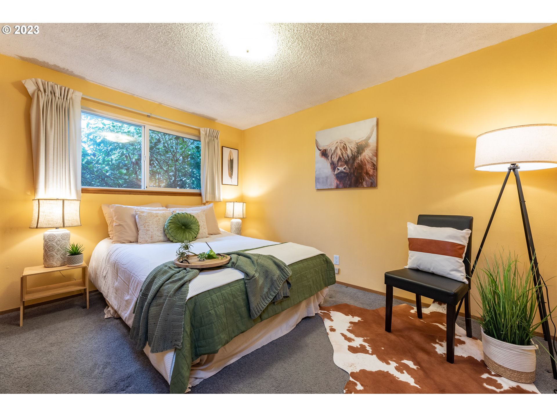 2434 Southwest 328th Street Federal Way, WA 98023 - Photo 21 of 31 a bedroom with a bed a chair and a large window