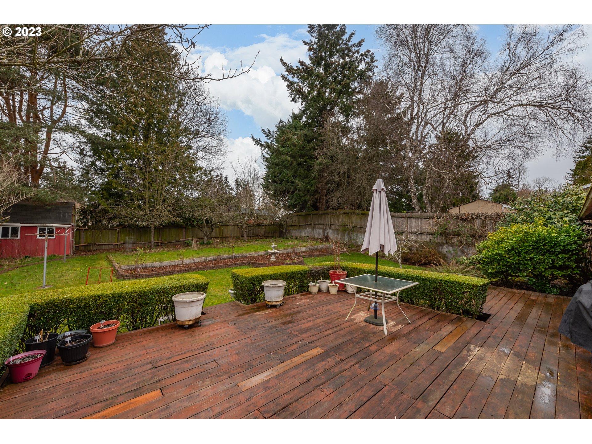 2434 Southwest 328th Street Federal Way, WA 98023 - Photo 25 of 31 a view of a swimming pool with a patio and a yard