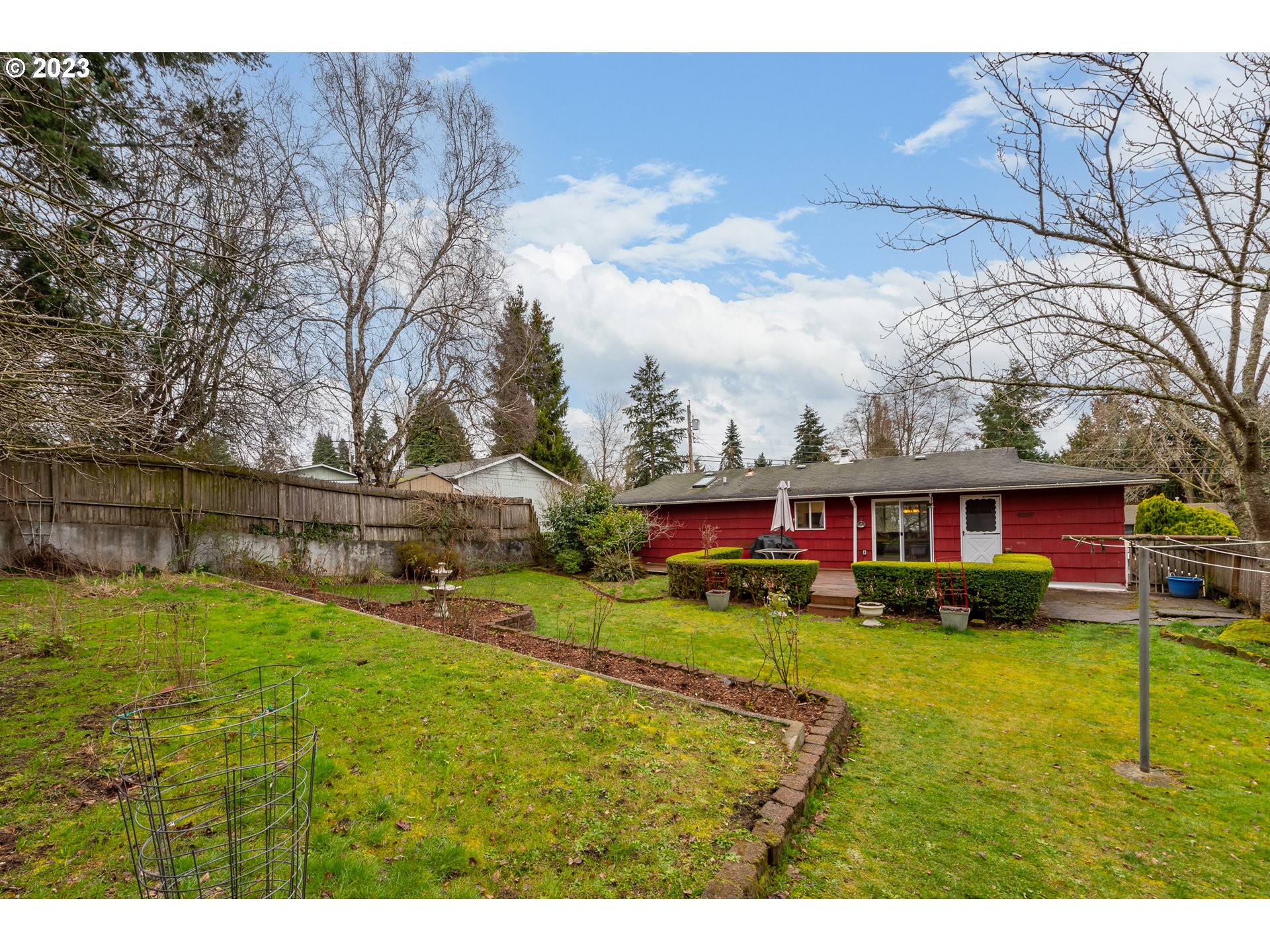 2434 Southwest 328th Street Federal Way, WA 98023 - Photo 28 of 31 a view of a house with a yard and sitting area