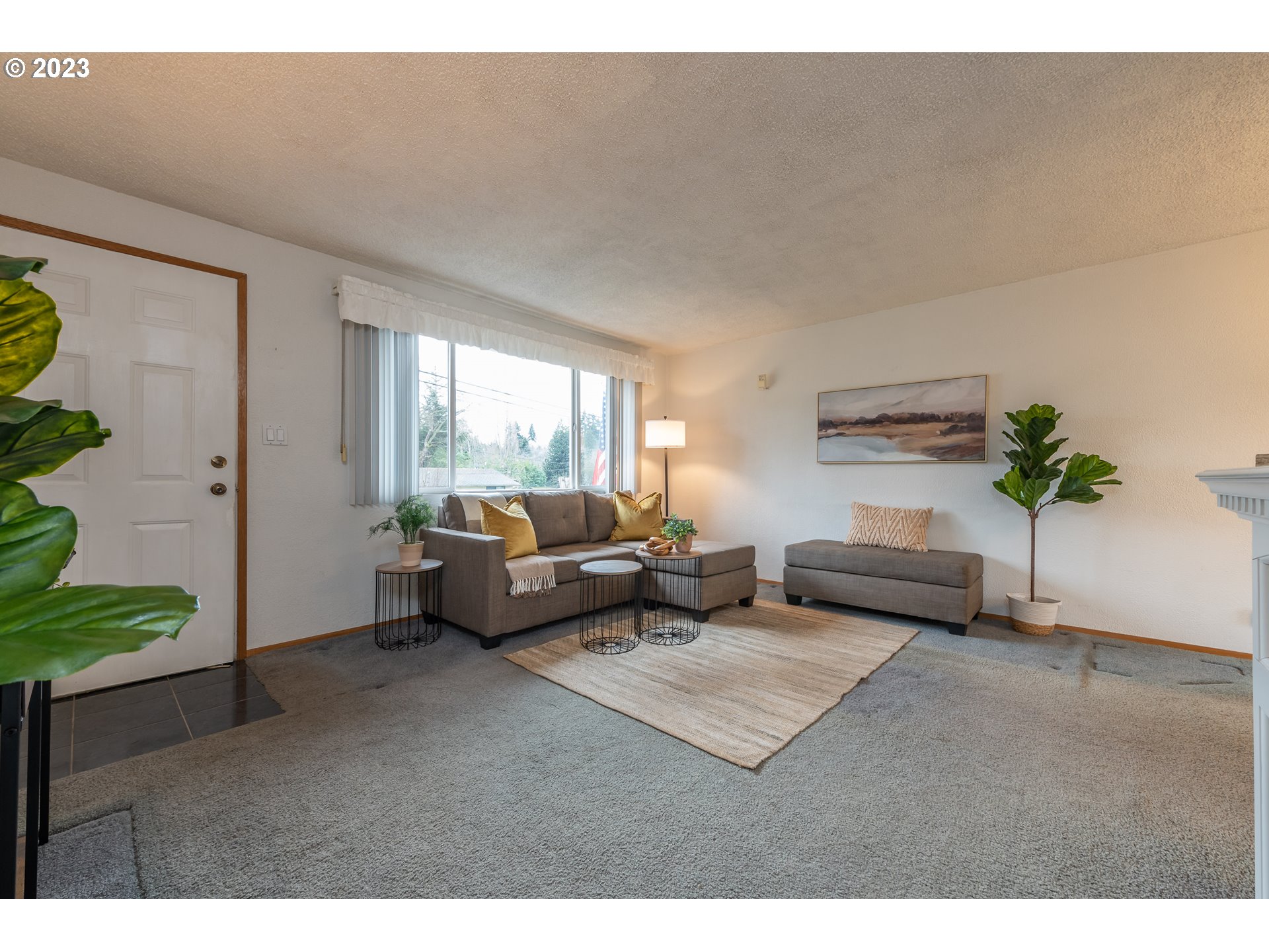 2434 Southwest 328th Street Federal Way, WA 98023 - Photo 7 of 31 a living room with furniture and a potted plant