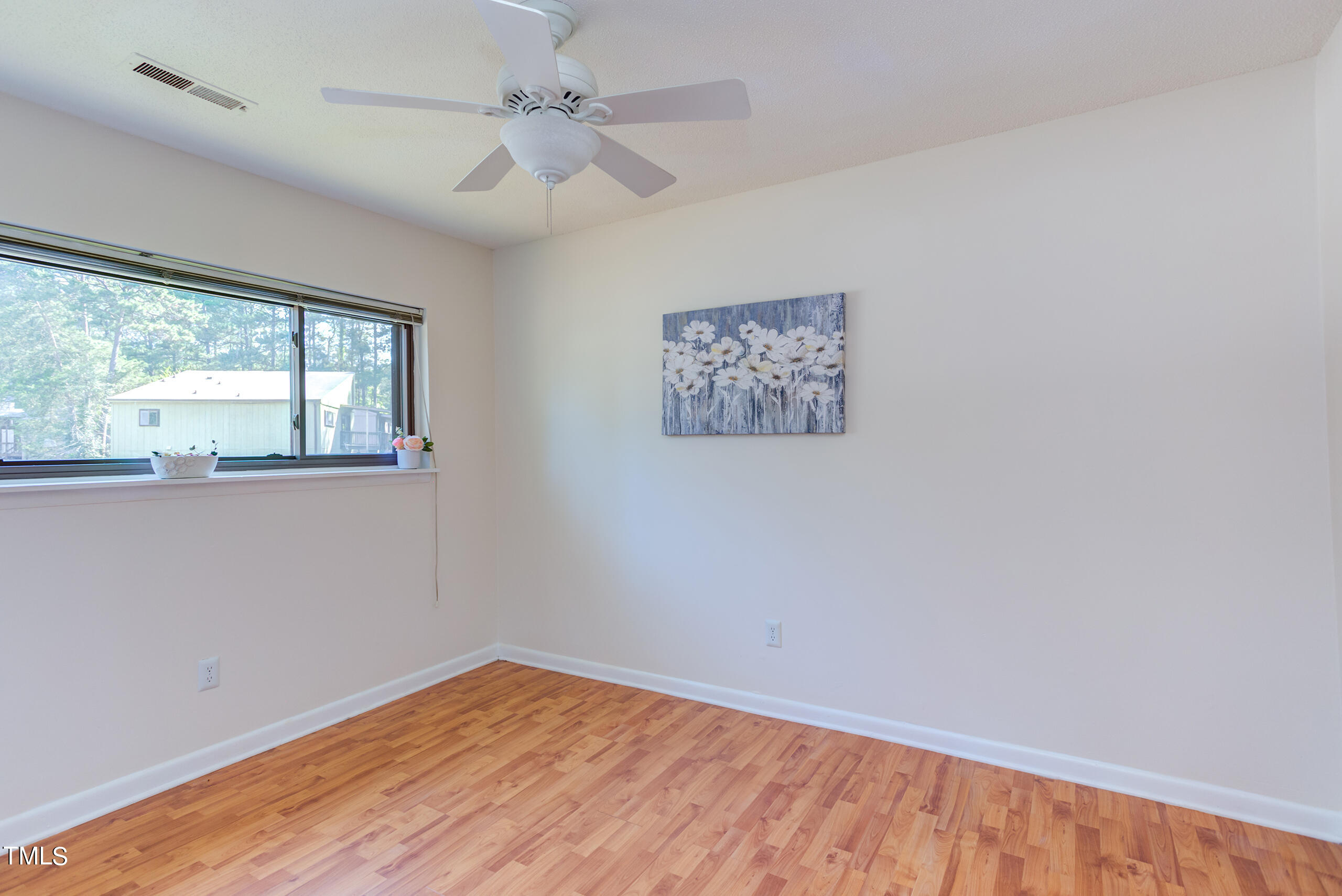 616 Pine Ridge Place Raleigh, NC 27609 - Photo 24 of 32 Secondary Bedroom 1