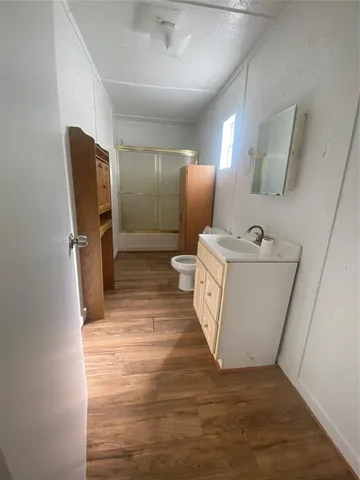 a view of a storage & utility room with a sink