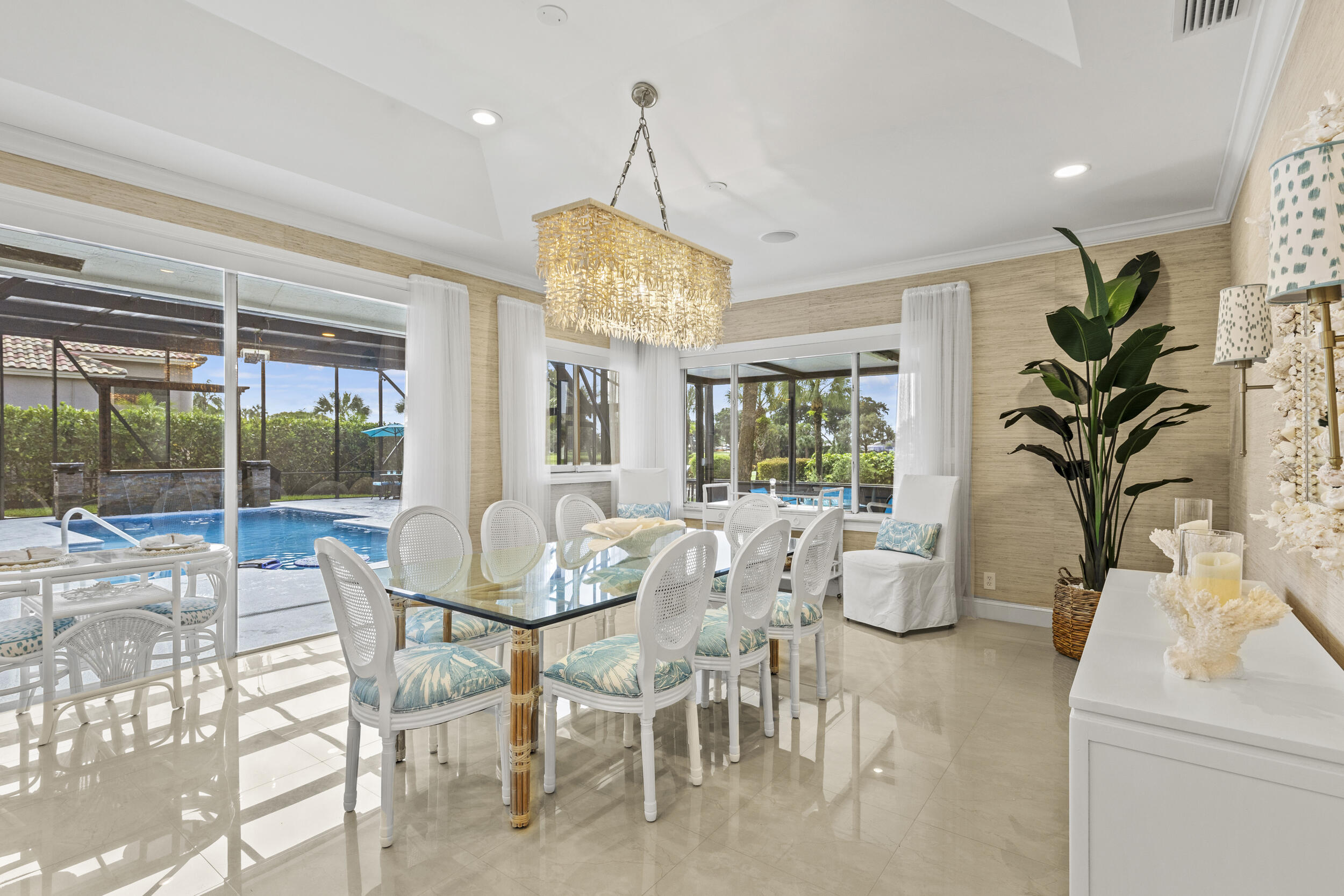 10431 Stonebridge Boulevard Boca Raton, FL 33498 - Photo 11 of 52 a view of a dining room with furniture window and outside view