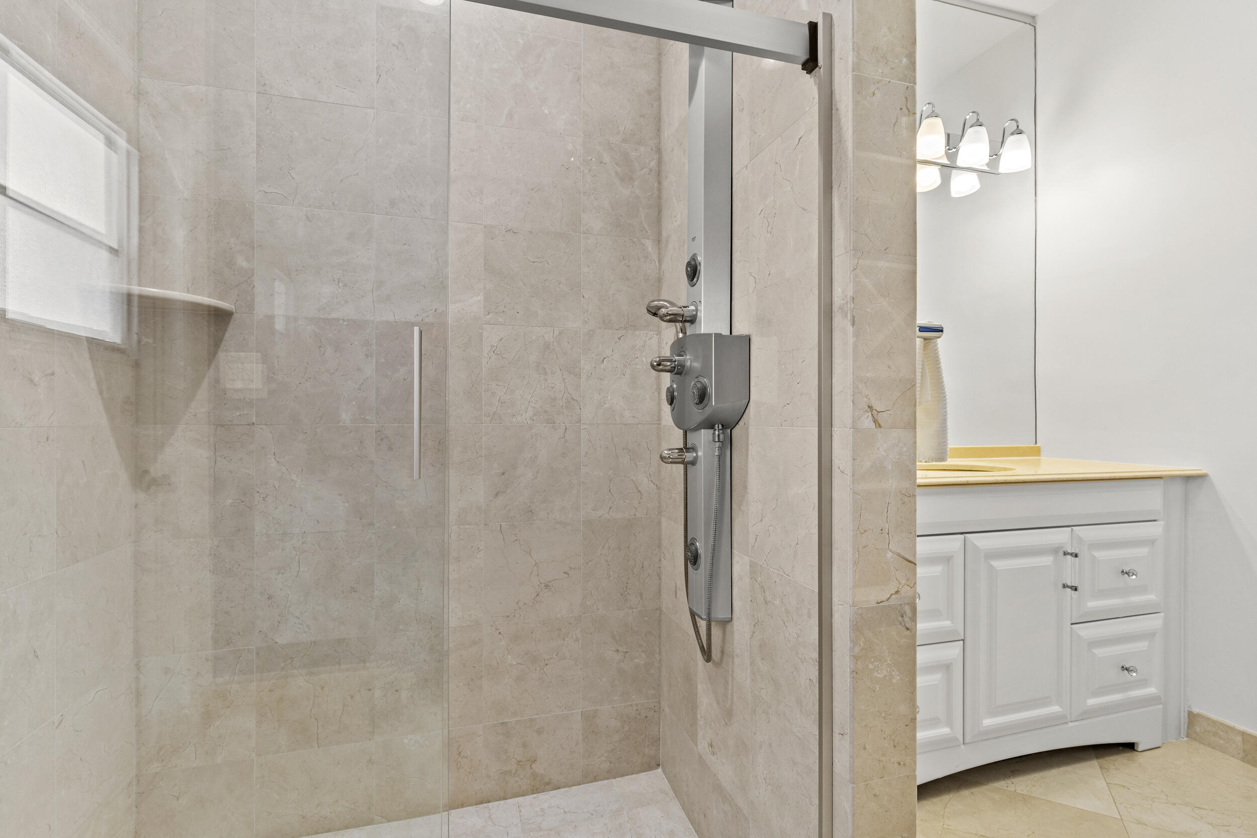 10431 Stonebridge Boulevard Boca Raton, FL 33498 - Photo 26 of 52 a bathroom with a shower