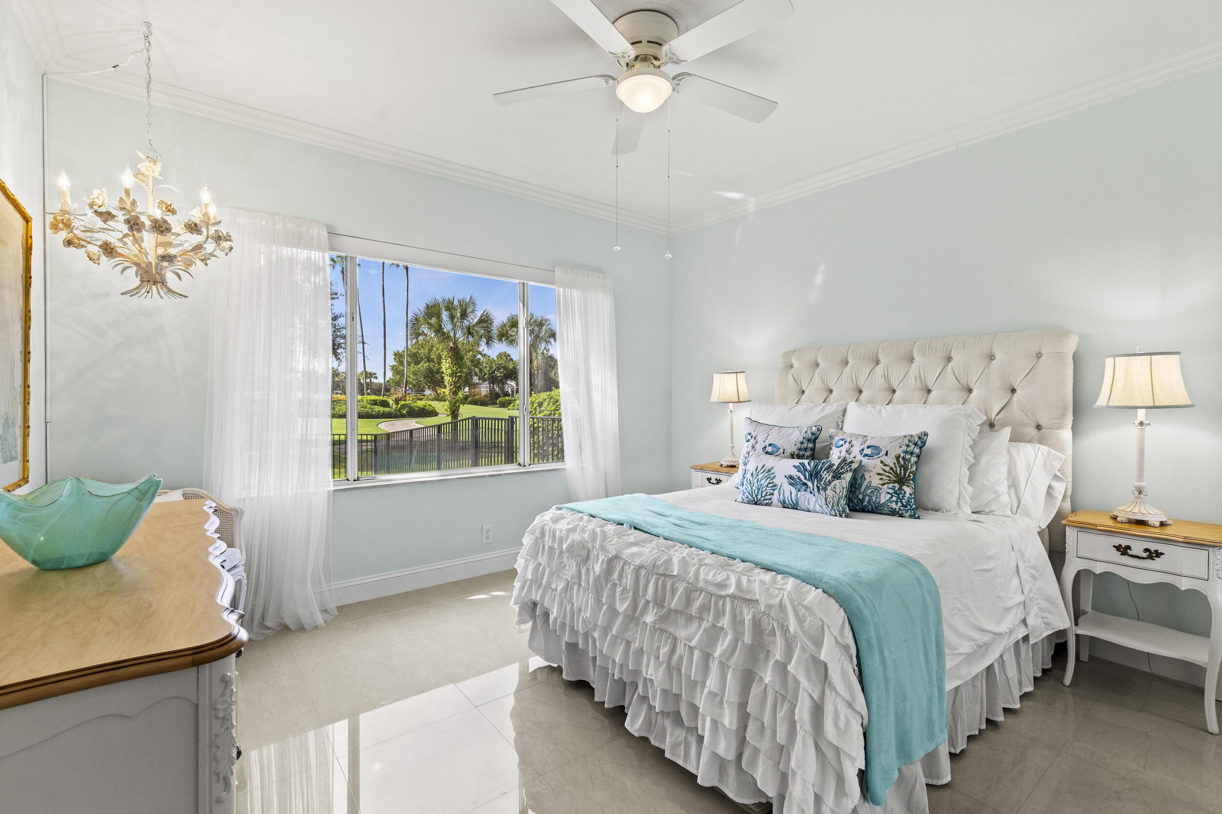 10431 Stonebridge Boulevard Boca Raton, FL 33498 - Photo 30 of 52 a bedroom with a bed and a window