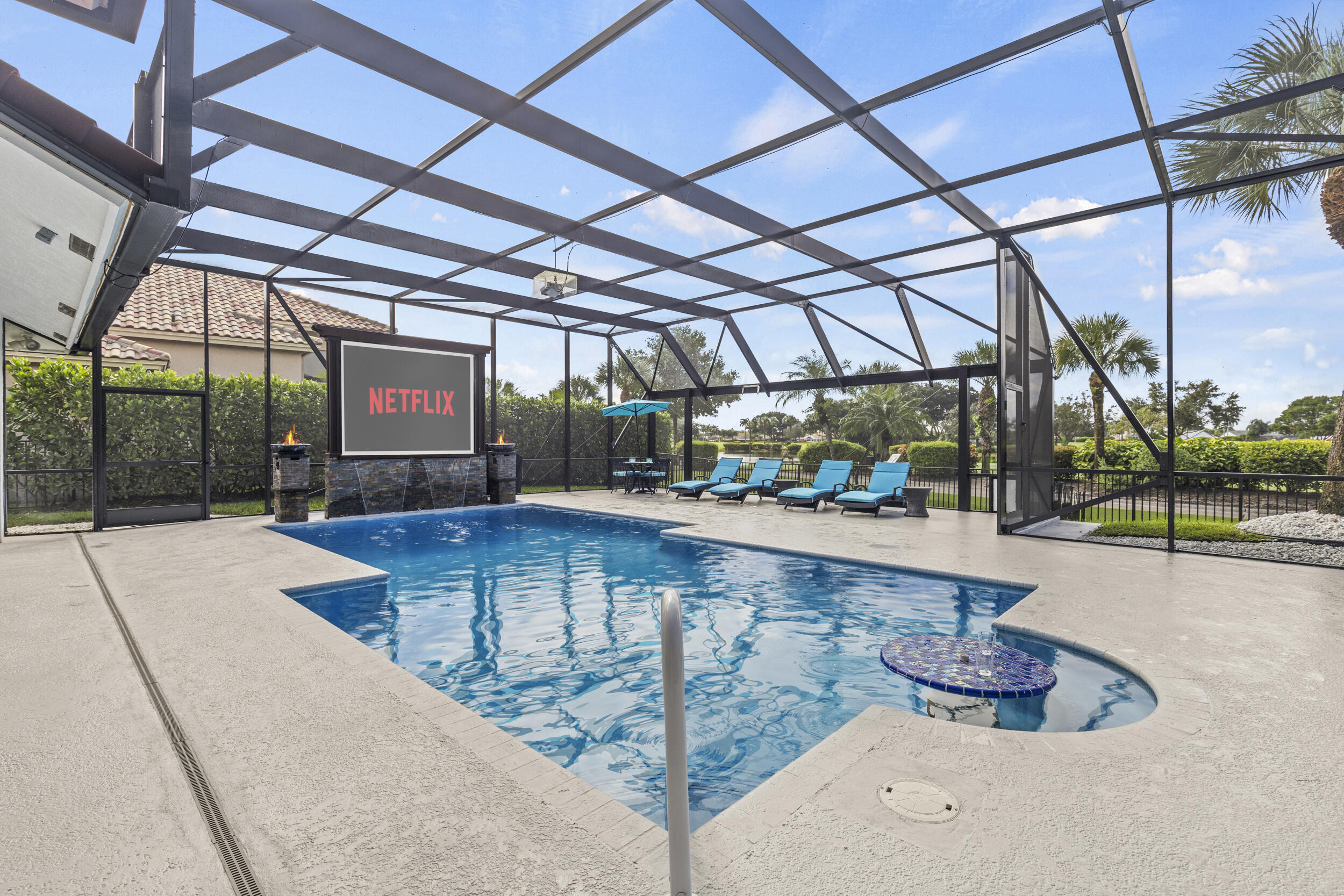 10431 Stonebridge Boulevard Boca Raton, FL 33498 - Photo 35 of 52 a view of a swimming pool with a patio