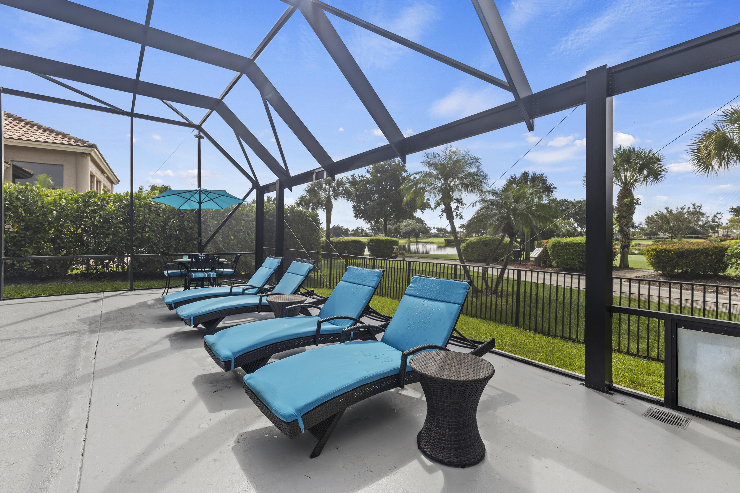 10431 Stonebridge Boulevard Boca Raton, FL 33498 - Photo 38 of 52 a view of a chairs and table in the patio
