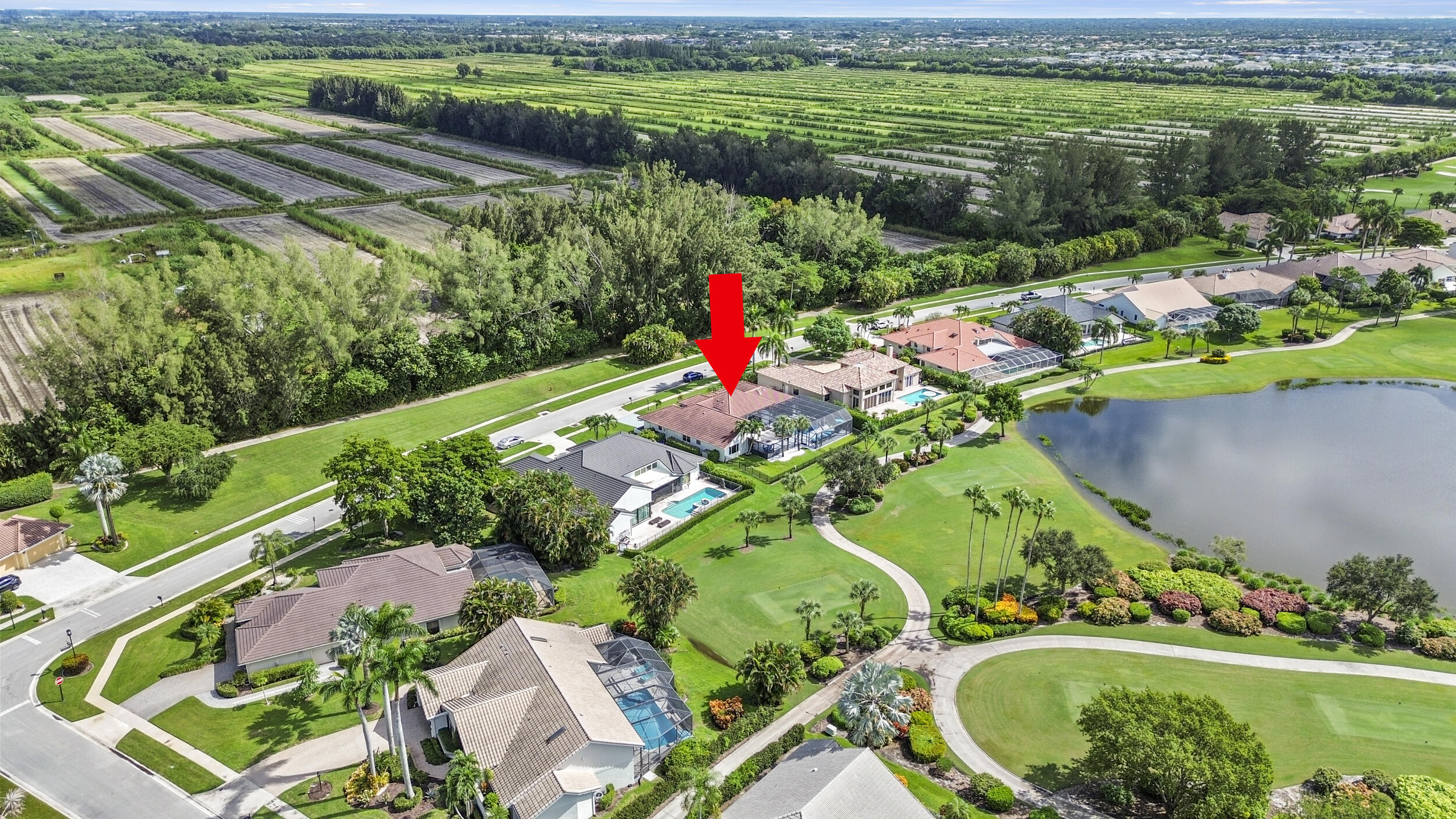 10431 Stonebridge Boulevard Boca Raton, FL 33498 - Photo 46 of 52 an aerial view of a house with a yard and outdoor seating