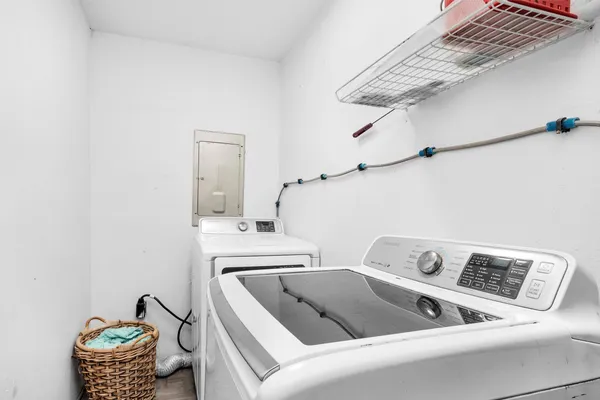 a utility room with dryer and washer
