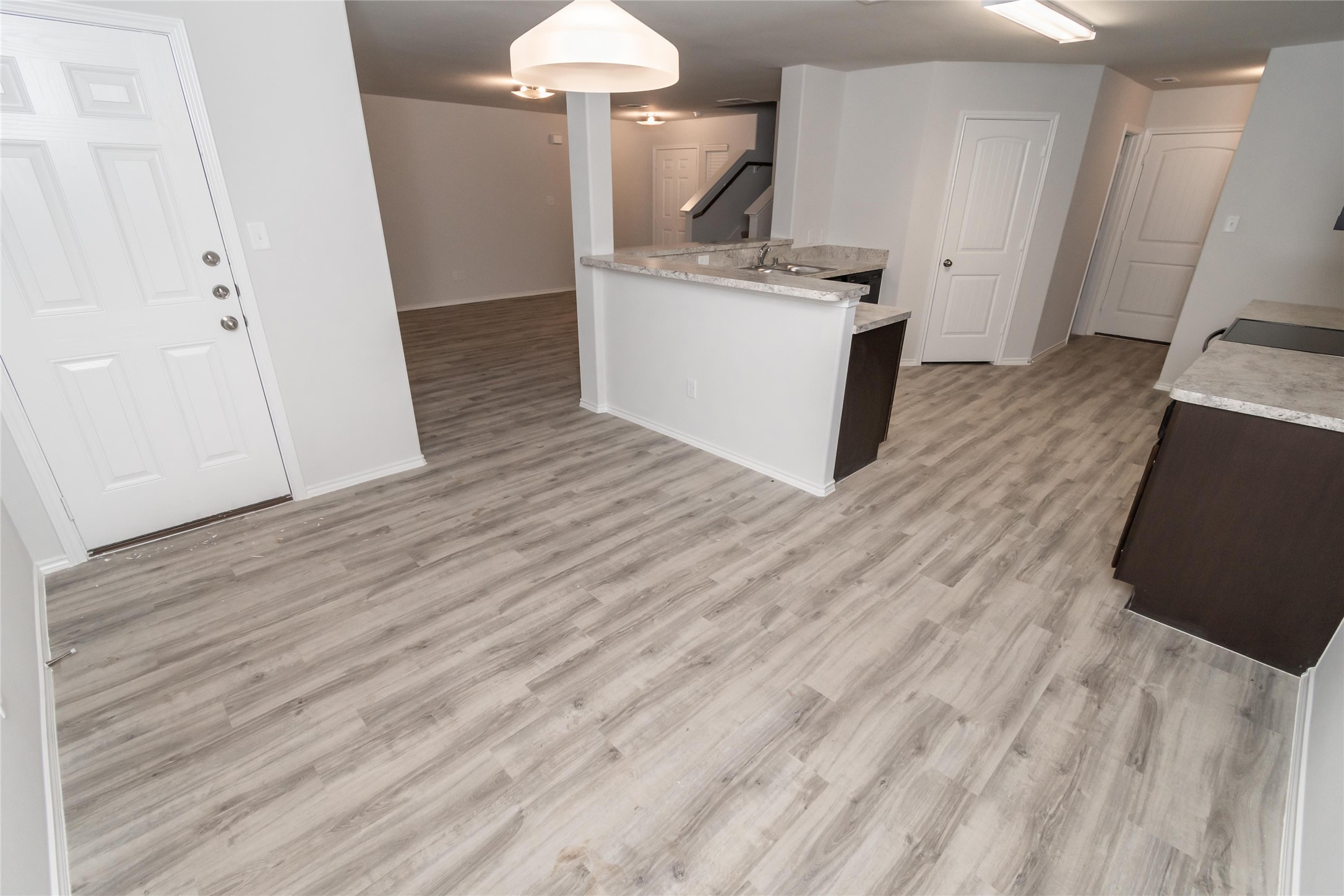 18607 Bell Ravine Drive Katy, TX 77449 - Photo 5 of 10 a kitchen with a sink and a stove top oven