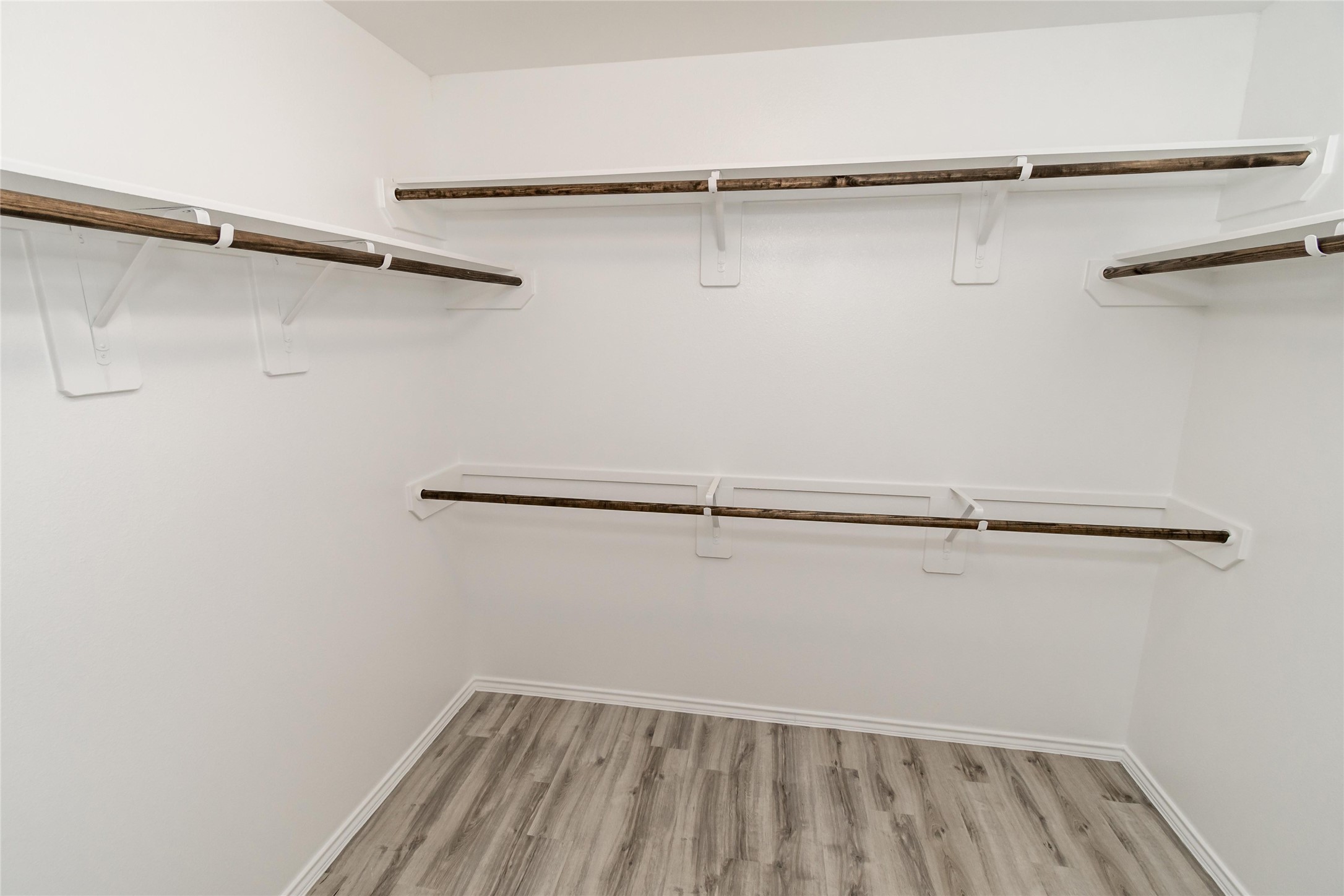 18607 Bell Ravine Drive Katy, TX 77449 - Photo 10 of 10 a view of a room with racks on the wall