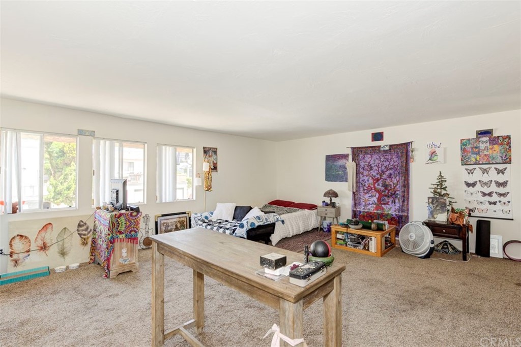 239 Avenida Santa Barbara San Clemente, CA 92672 - Photo 13 of 29 a living room with furniture a flat screen tv and a window
