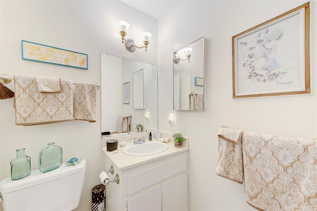 239 Avenida Santa Barbara San Clemente, CA 92672 - Photo 19 of 29 a bathroom with a sink and a mirror