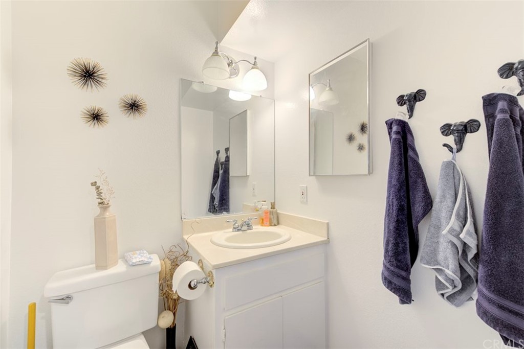 239 Avenida Santa Barbara San Clemente, CA 92672 - Photo 26 of 29 a bathroom with a sink vanity and a mirror