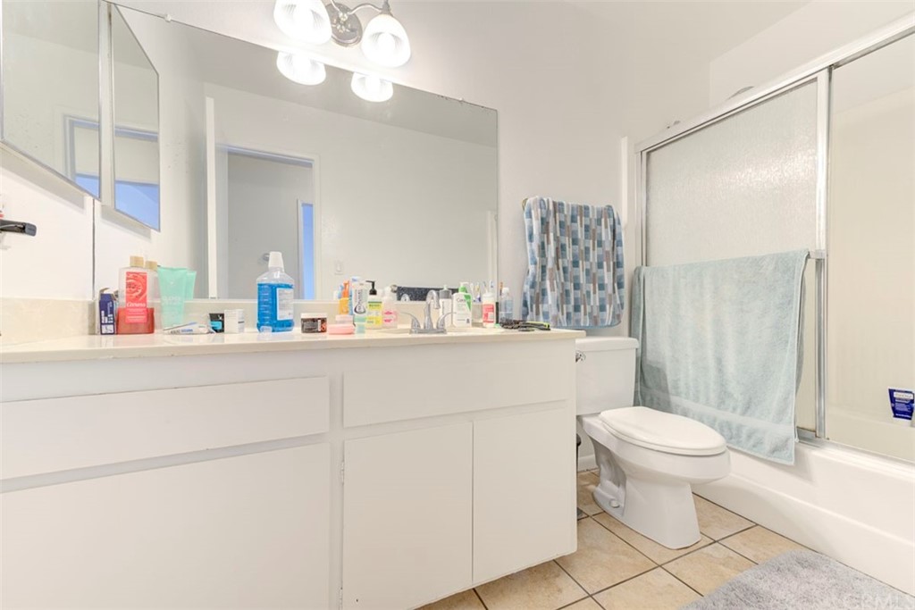 239 Avenida Santa Barbara San Clemente, CA 92672 - Photo 29 of 29 a bathroom with a sink a toilet and a mirror