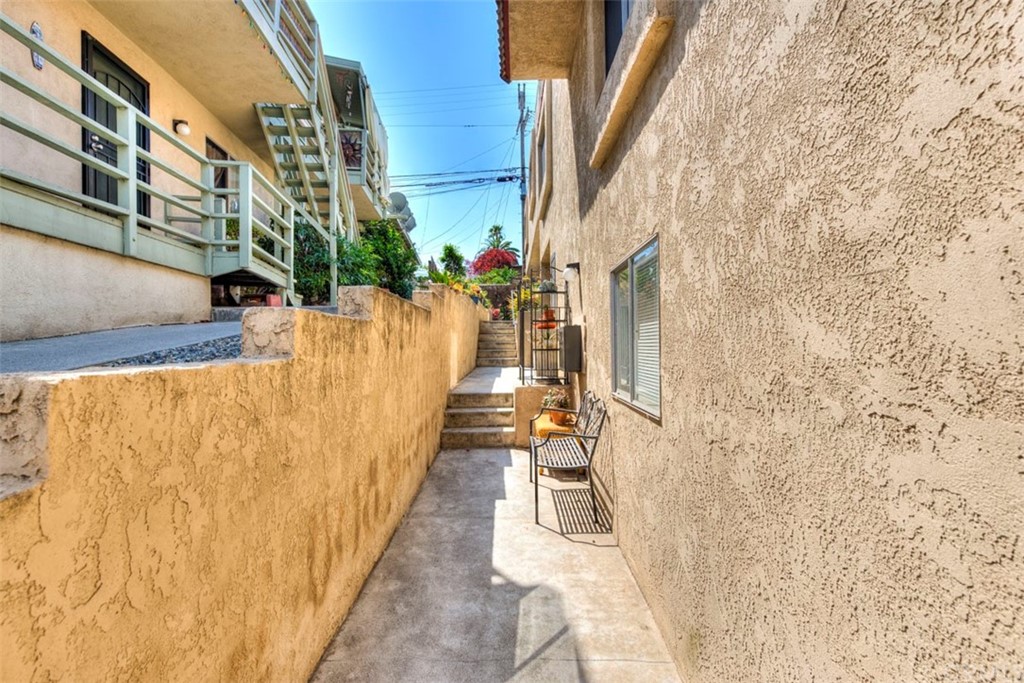 239 Avenida Santa Barbara San Clemente, CA 92672 - Photo 4 of 29 a view of a pathway along with brick wall